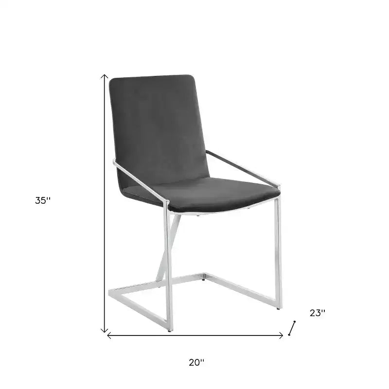 Ensemble de deux chaises de salle à manger d'appoint en velours et métal gris et argent.