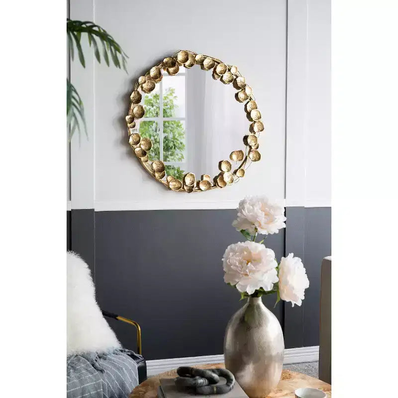 Miroir mural rond en métal de 35 pouces avec accents de feuilles dorées