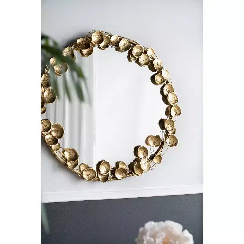 Miroir mural rond en métal de 35 pouces avec accents de feuilles dorées
