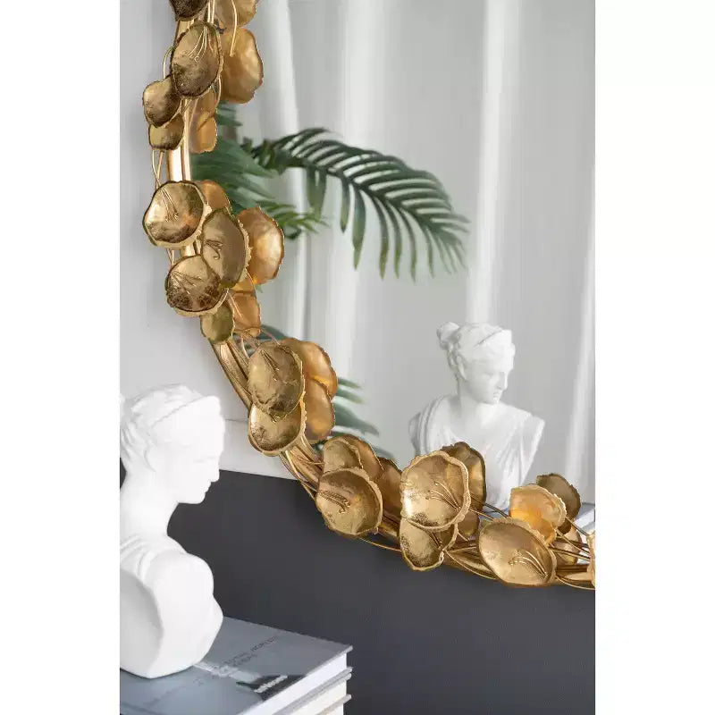 Miroir mural rond en métal de 35 pouces avec accents de feuilles dorées
